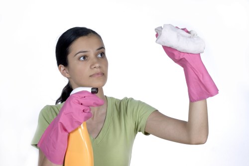 Senior staff member assessing a carpet cleaning issue for resolution